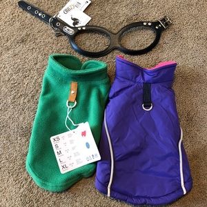 Set of dog sweaters and harness